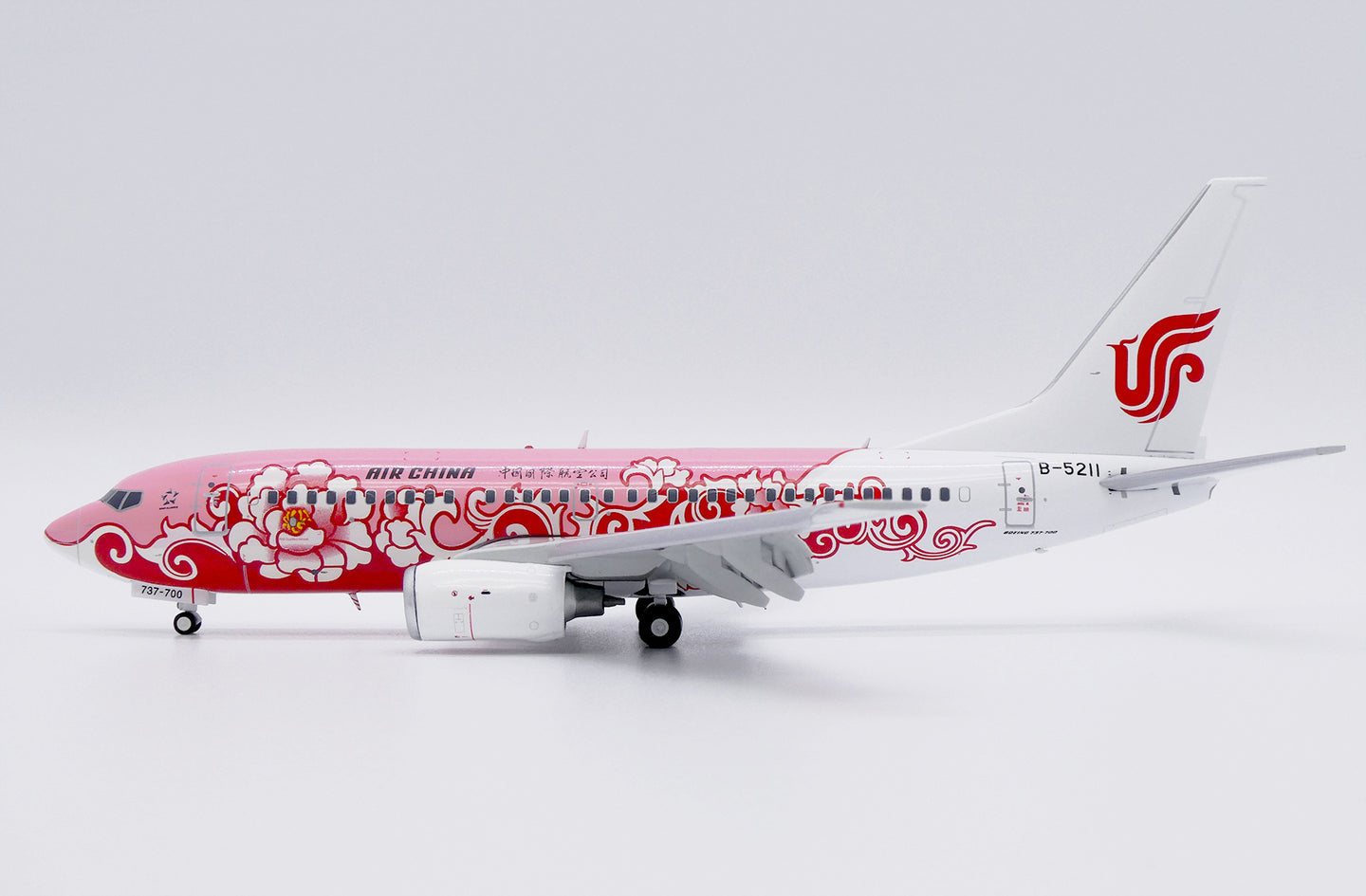 JC WINGS B737-700 AIR CHINA "RED PEONY" (FLAPS DOWN) REG: B-5211