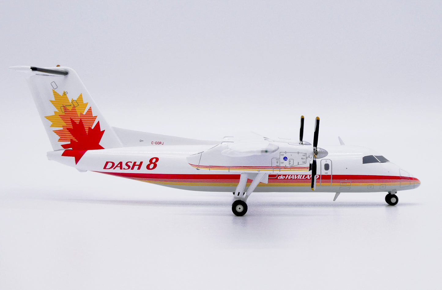 JC WINGS  DE HAVILLAND CANADA DASH 8-Q100 HOUSE COLOR REG: C-GGPJ