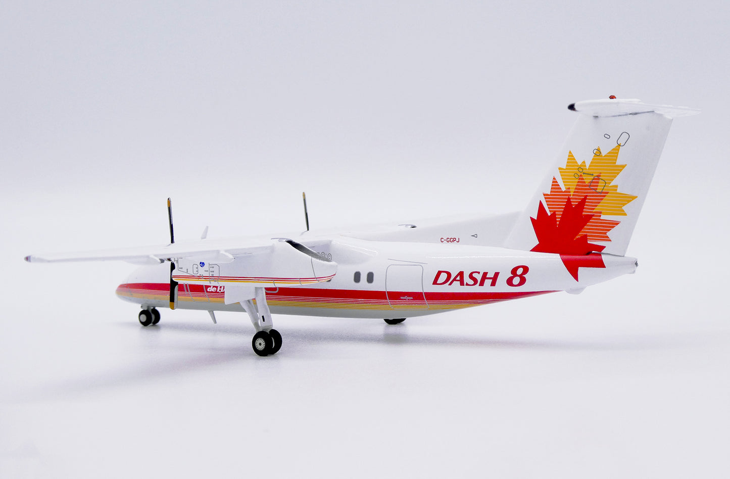 JC WINGS  DE HAVILLAND CANADA DASH 8-Q100 HOUSE COLOR REG: C-GGPJ