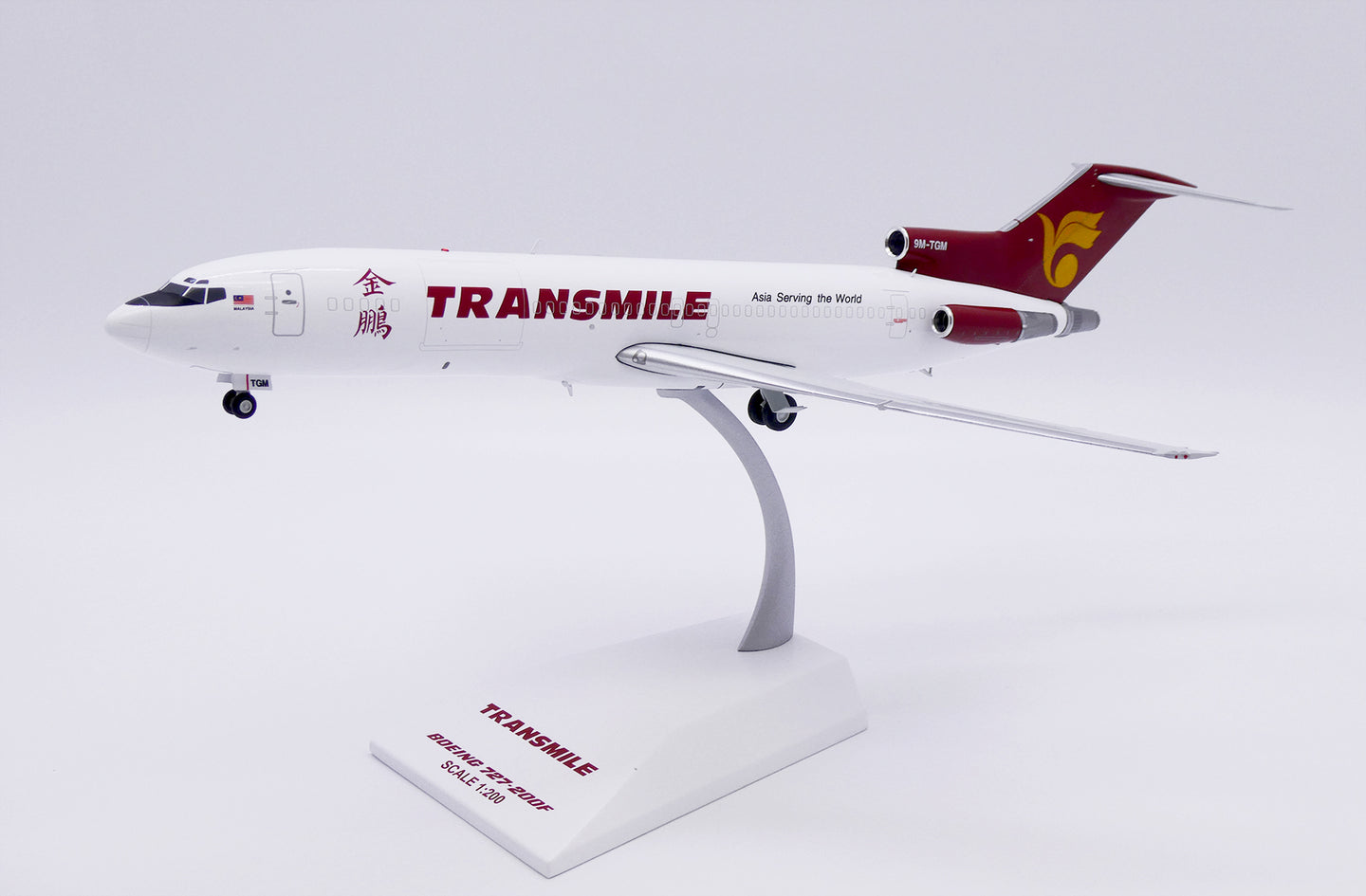 JCWINGS B727-200F(ADV) TRANSMILE AIR SERVICES REG: 9M-TGM