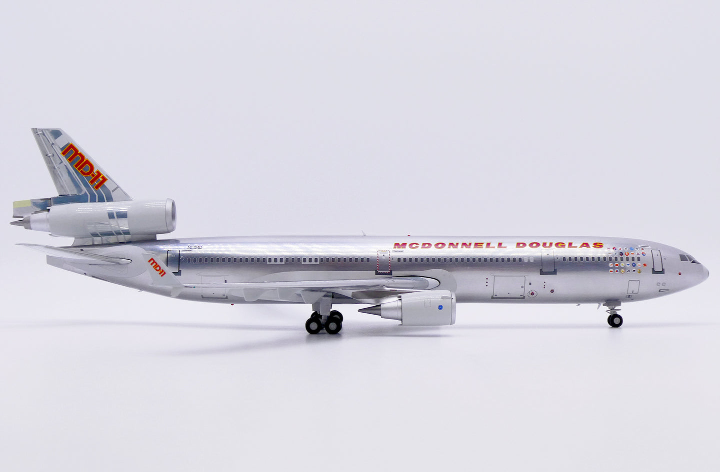 JC WINGS MD-11 HOUSE COLOURS (POLISHED) REG: N111MD