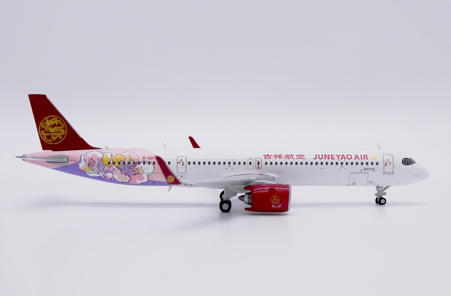 JCWINGS A321NEO JUNEYAO AIRLINES "BLESSED LAND" REG: B-32CJ