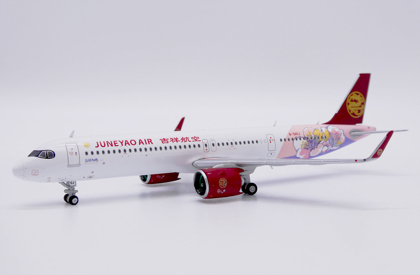 JCWINGS A321NEO JUNEYAO AIRLINES "BLESSED LAND" REG: B-32CJ