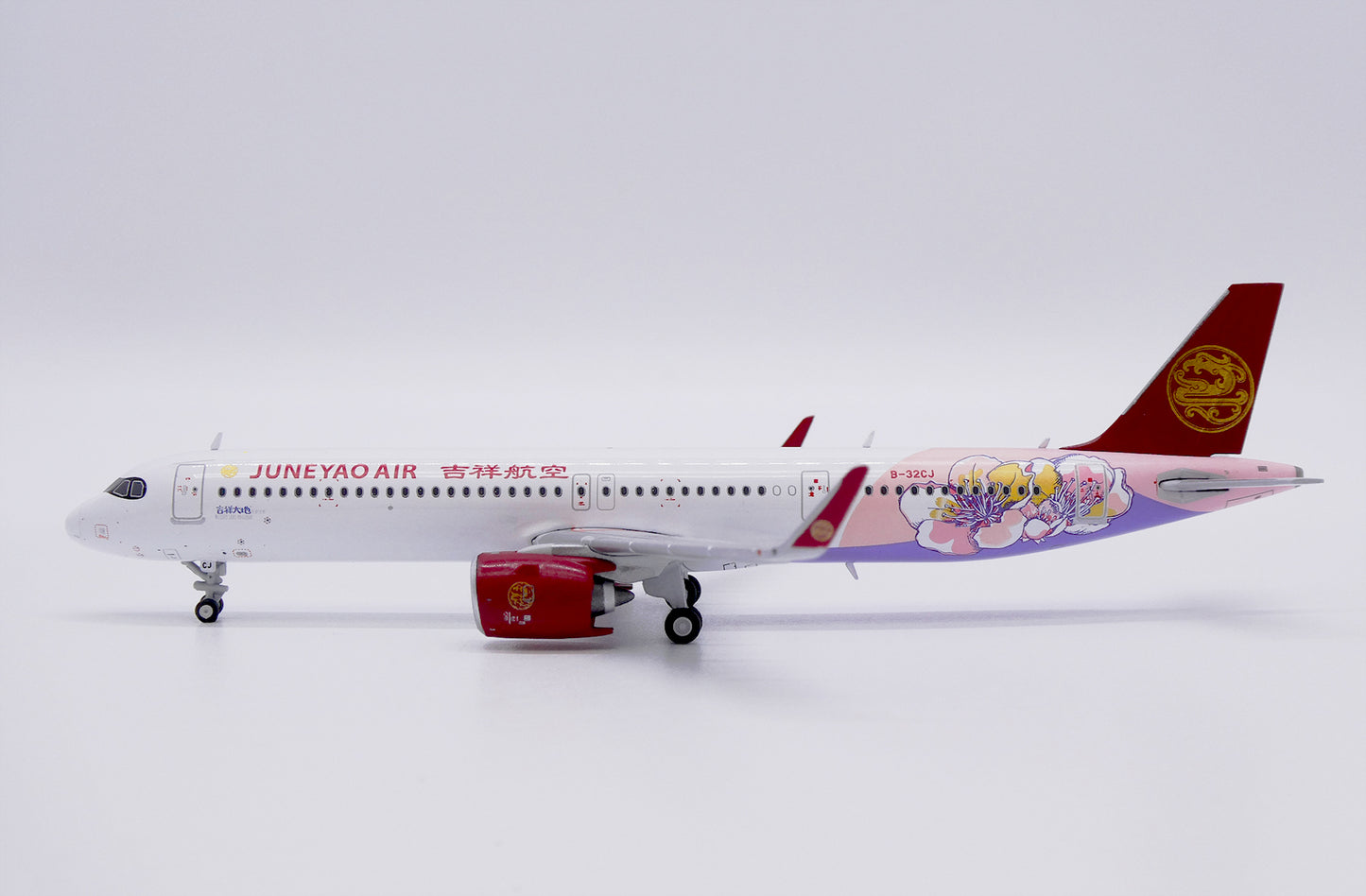 JCWINGS A321NEO JUNEYAO AIRLINES "BLESSED LAND" REG: B-32CJ