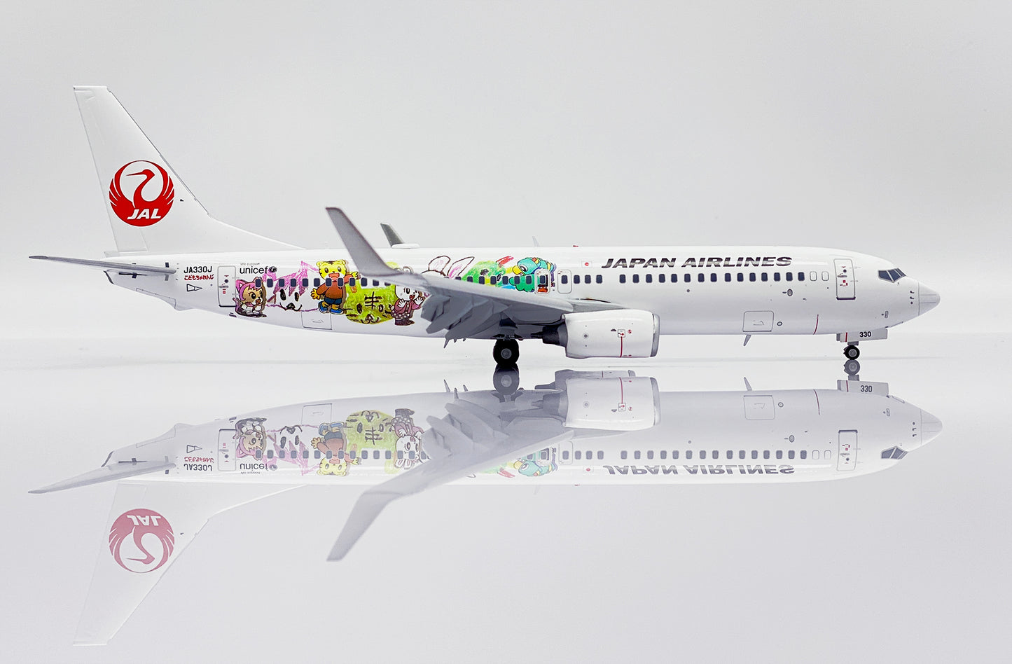 JC WINGS B737-800 JAPAN AIRLINES "SHIMAJIRO JET" (FLAPS DOWN) REG: JA330J
