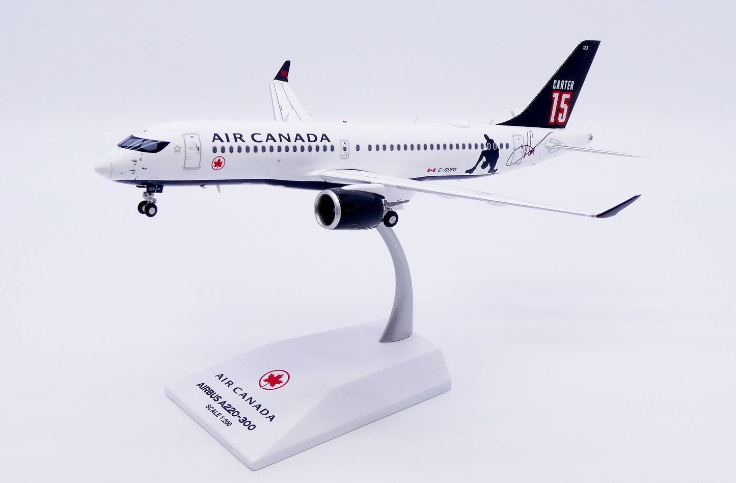 JC WINGS A220-300 AIR CANADA "CARTER 15" REG: C-GUPG