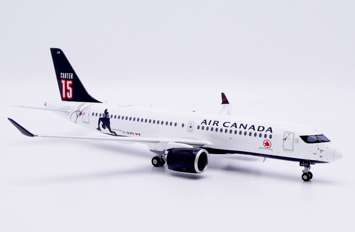 JC WINGS A220-300 AIR CANADA "CARTER 15" REG: C-GUPG