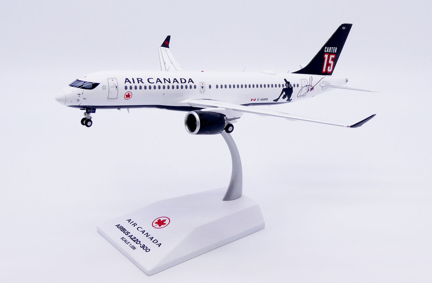 JC WINGS A220-300 AIR CANADA "CARTER 15" REG: C-GUPG
