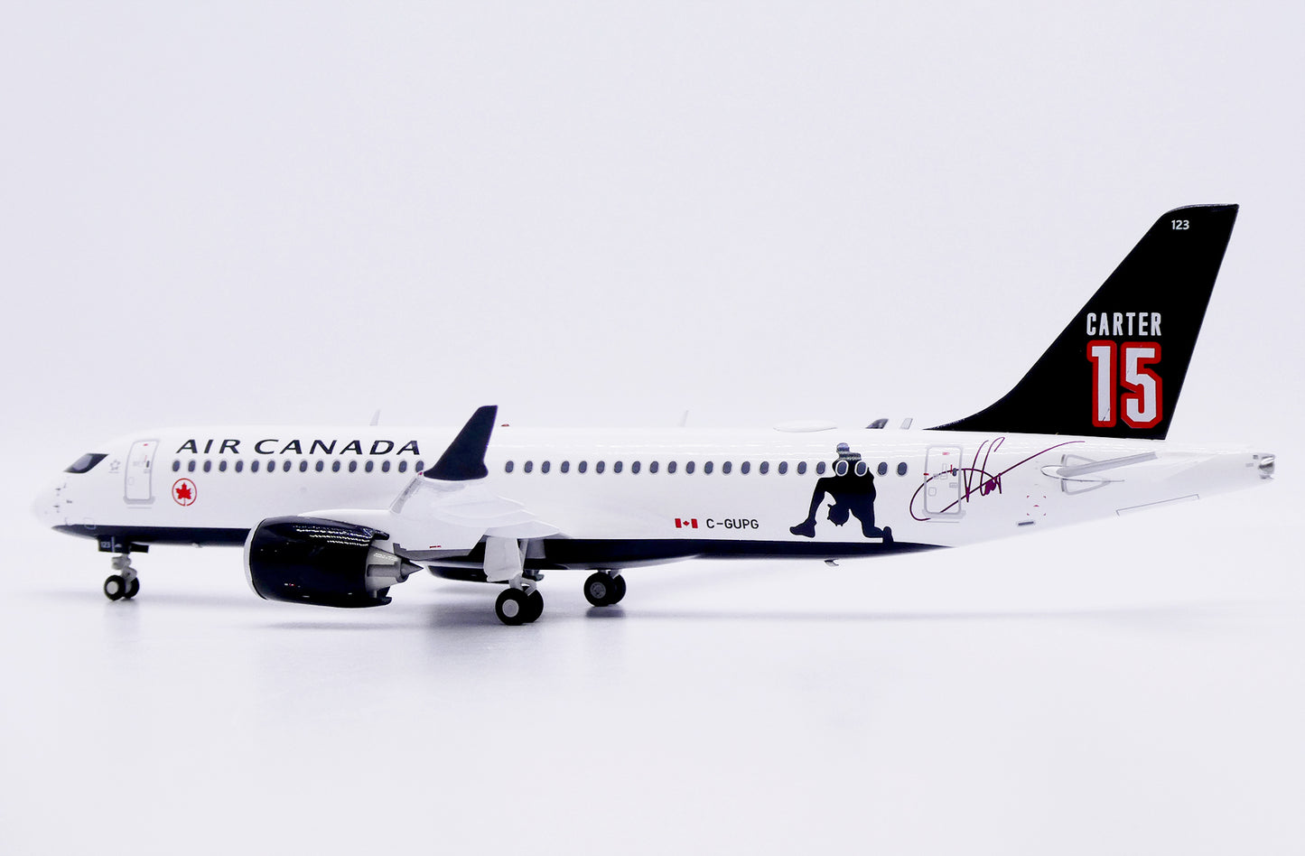 JC WINGS A220-300 AIR CANADA "CARTER 15" REG: C-GUPG