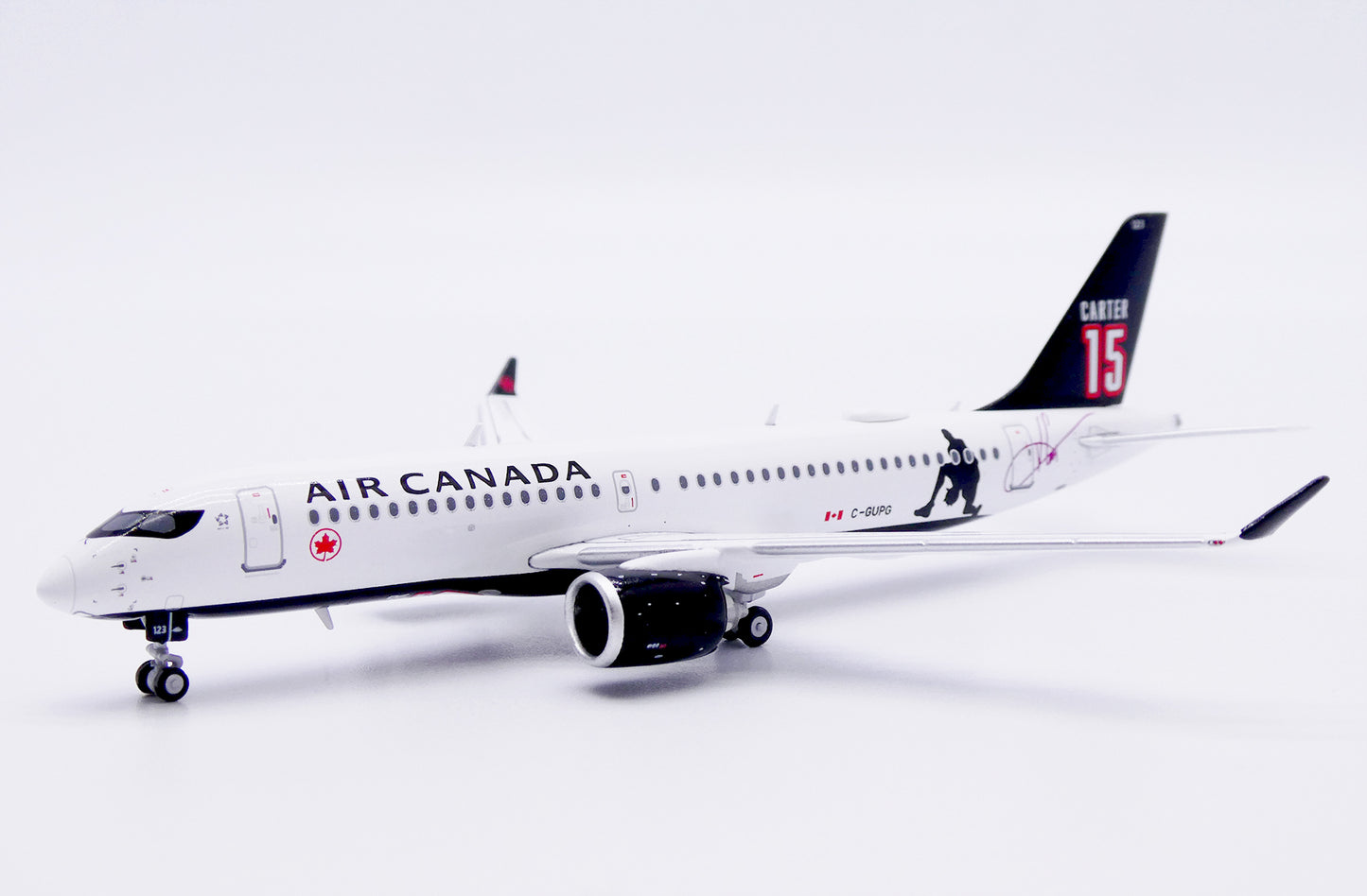 JC WINGS A220-300 AIR CANADA "CARTER 15" REG: C-GUPG