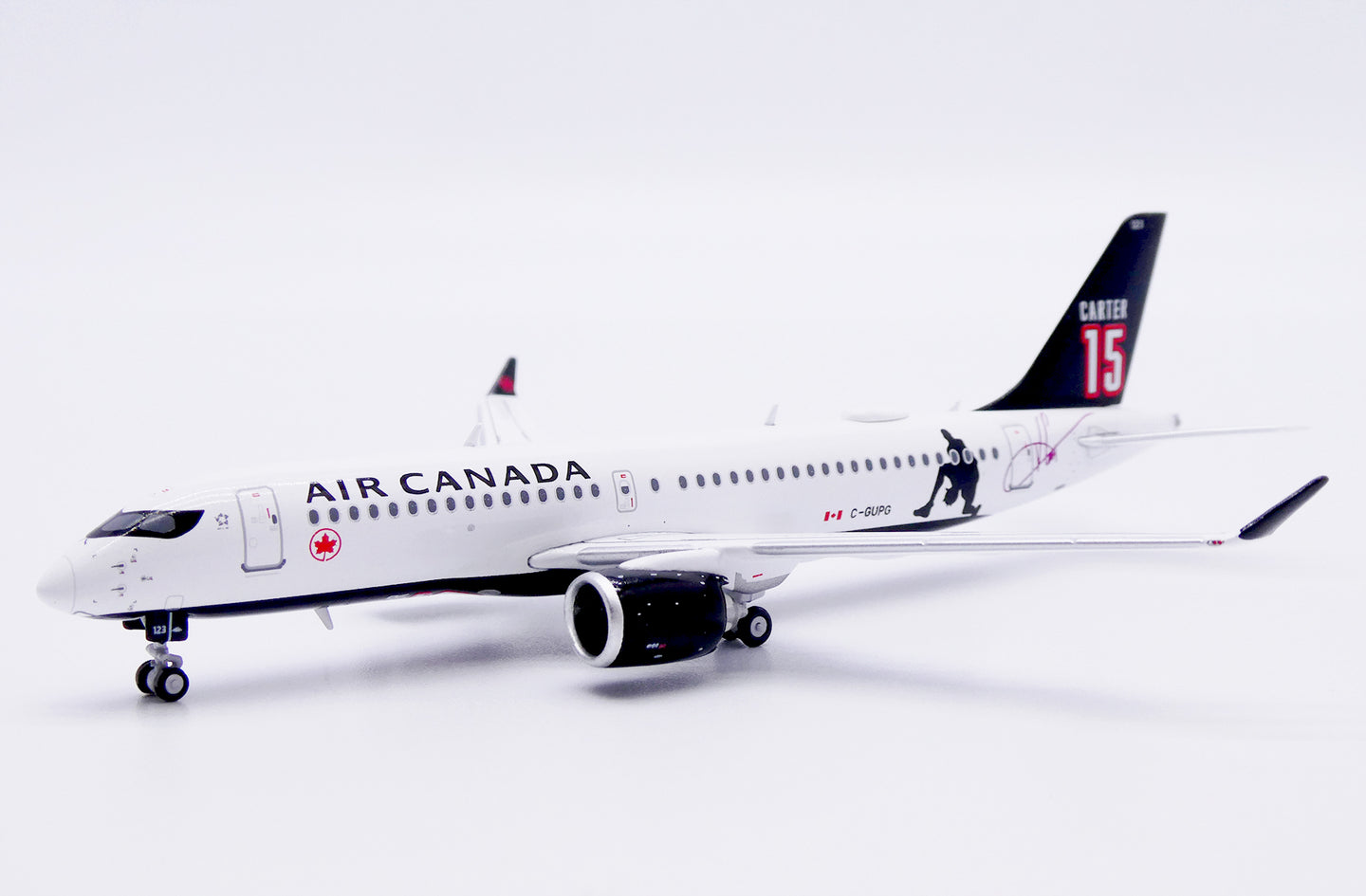 JC WINGS A220-300 AIR CANADA "CARTER 15" REG: C-GUPG