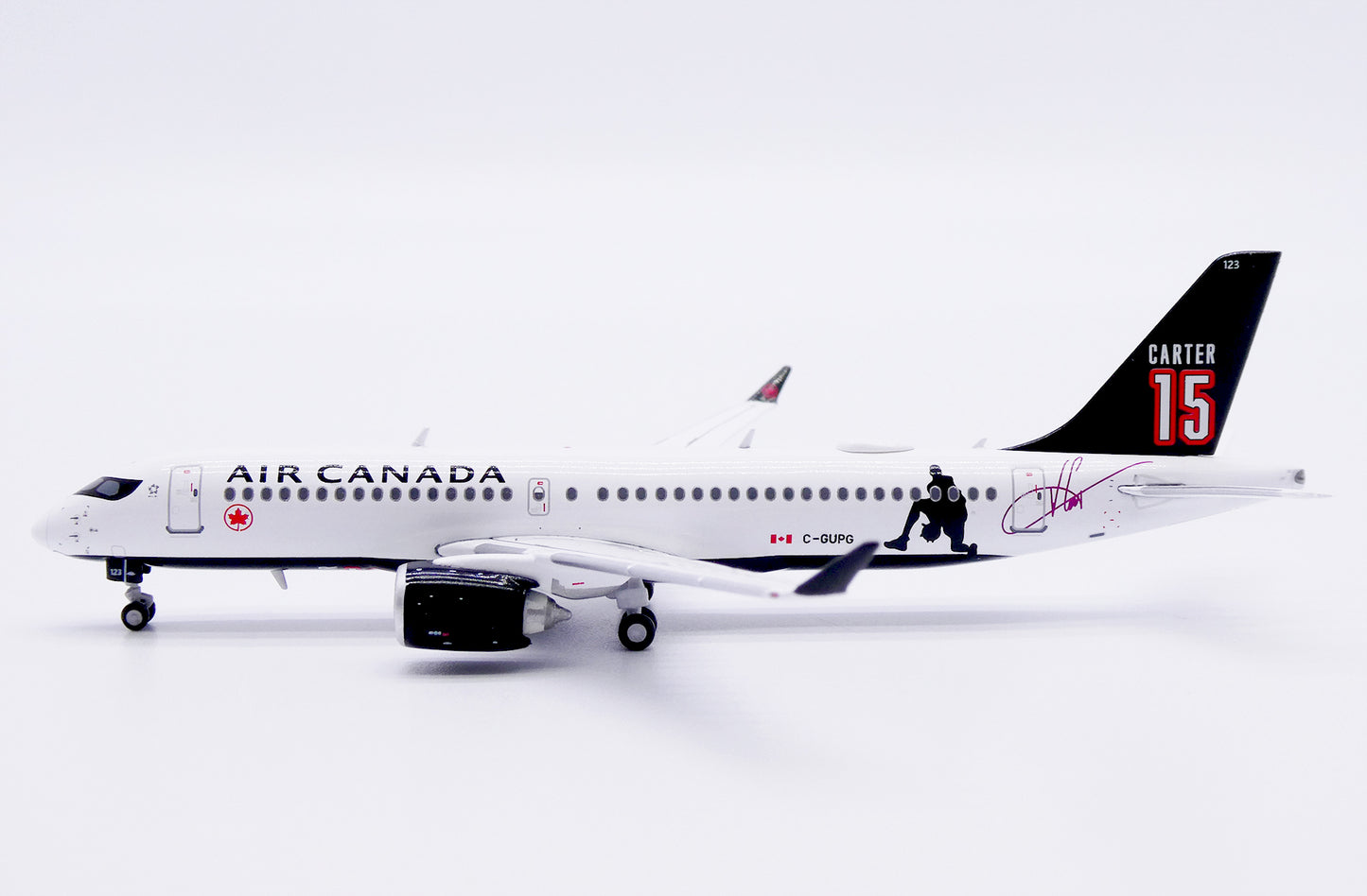 JC WINGS A220-300 AIR CANADA "CARTER 15" REG: C-GUPG