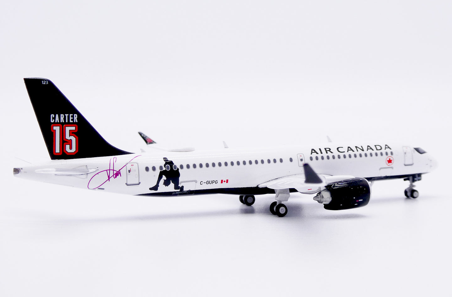 JC WINGS A220-300 AIR CANADA "CARTER 15" REG: C-GUPG