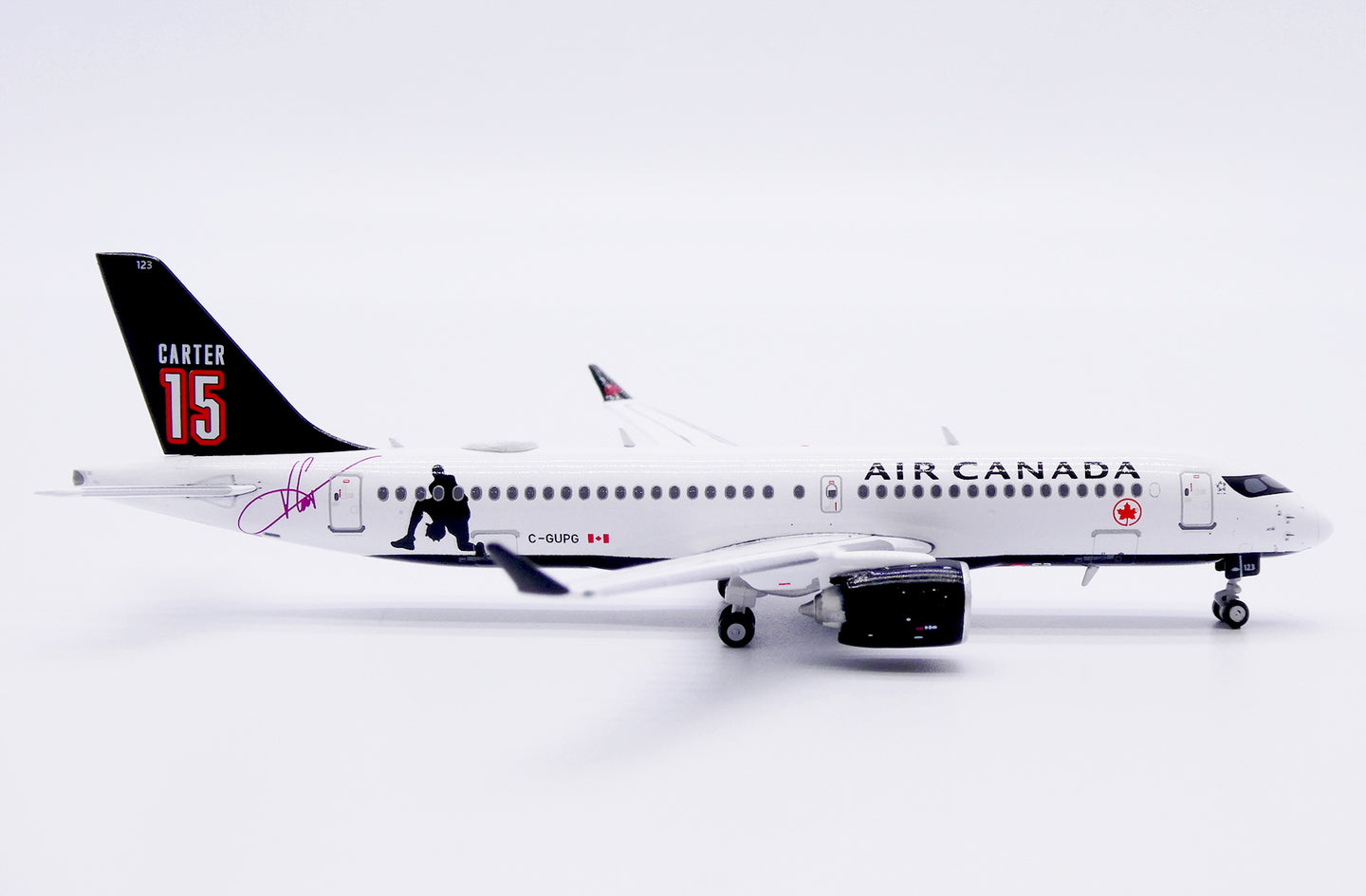 JC WINGS A220-300 AIR CANADA "CARTER 15" REG: C-GUPG