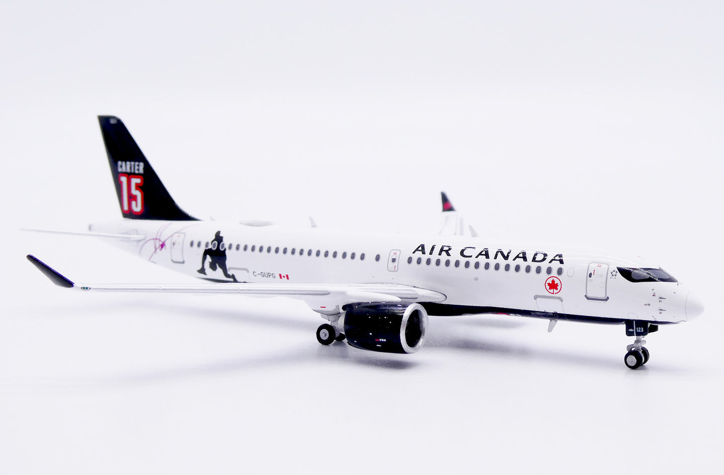 JC WINGS A220-300 AIR CANADA "CARTER 15" REG: C-GUPG