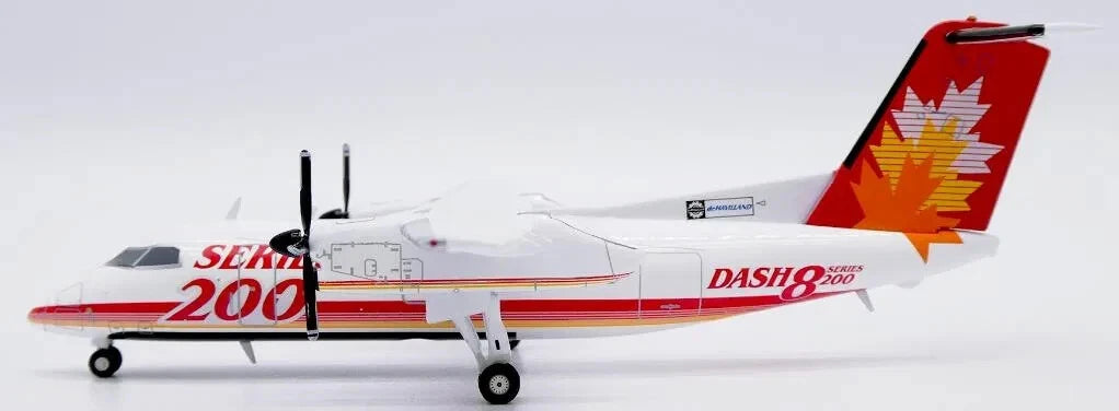 JC WINGS DASH 8-Q200 SERIES 200 HOUSE COLOUR REG: C-GGMP