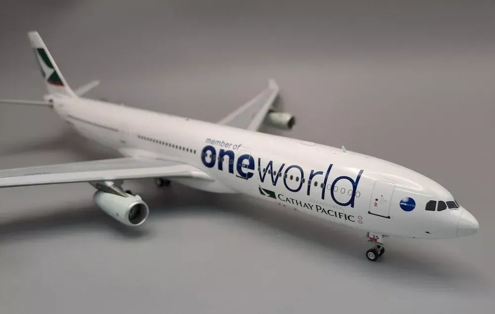 WB MODELS A340-313 CATHAY PACIFIC "ONE WORLD" REG: B-HXG