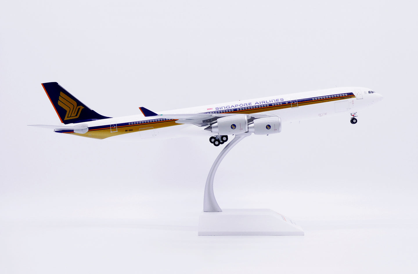 JC WINGS A340-500 SINGAPORE AIRLINES "OLD TITLES" REG: 9V-SGC