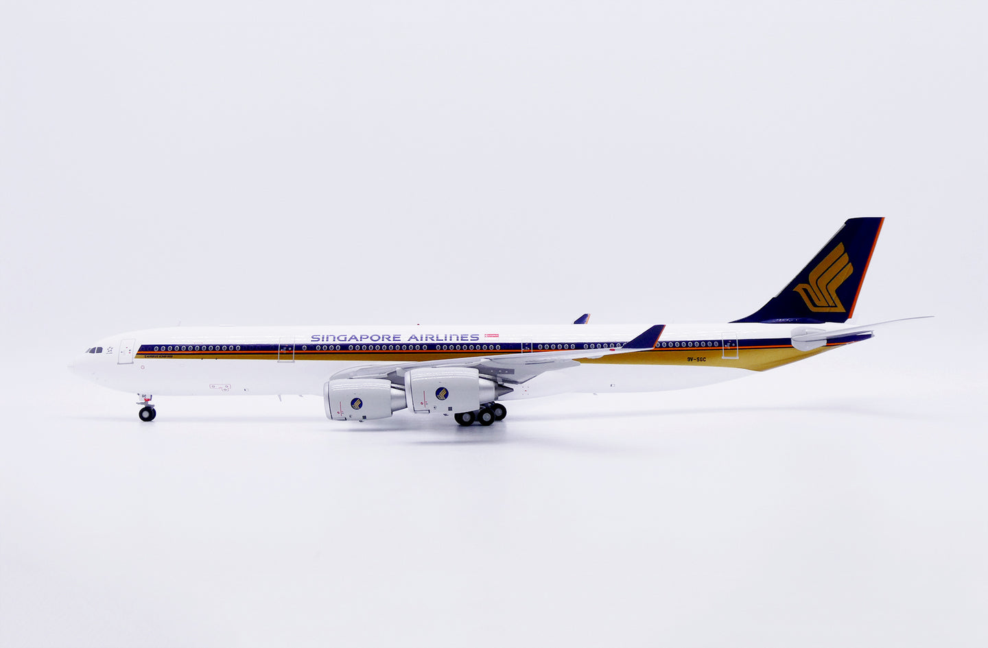 JC WINGS A340-500 SINGAPORE AIRLINES "OLD TITLES" REG: 9V-SGC