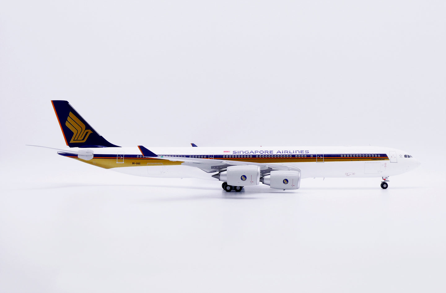JC WINGS A340-500 SINGAPORE AIRLINES "OLD TITLES" REG: 9V-SGC