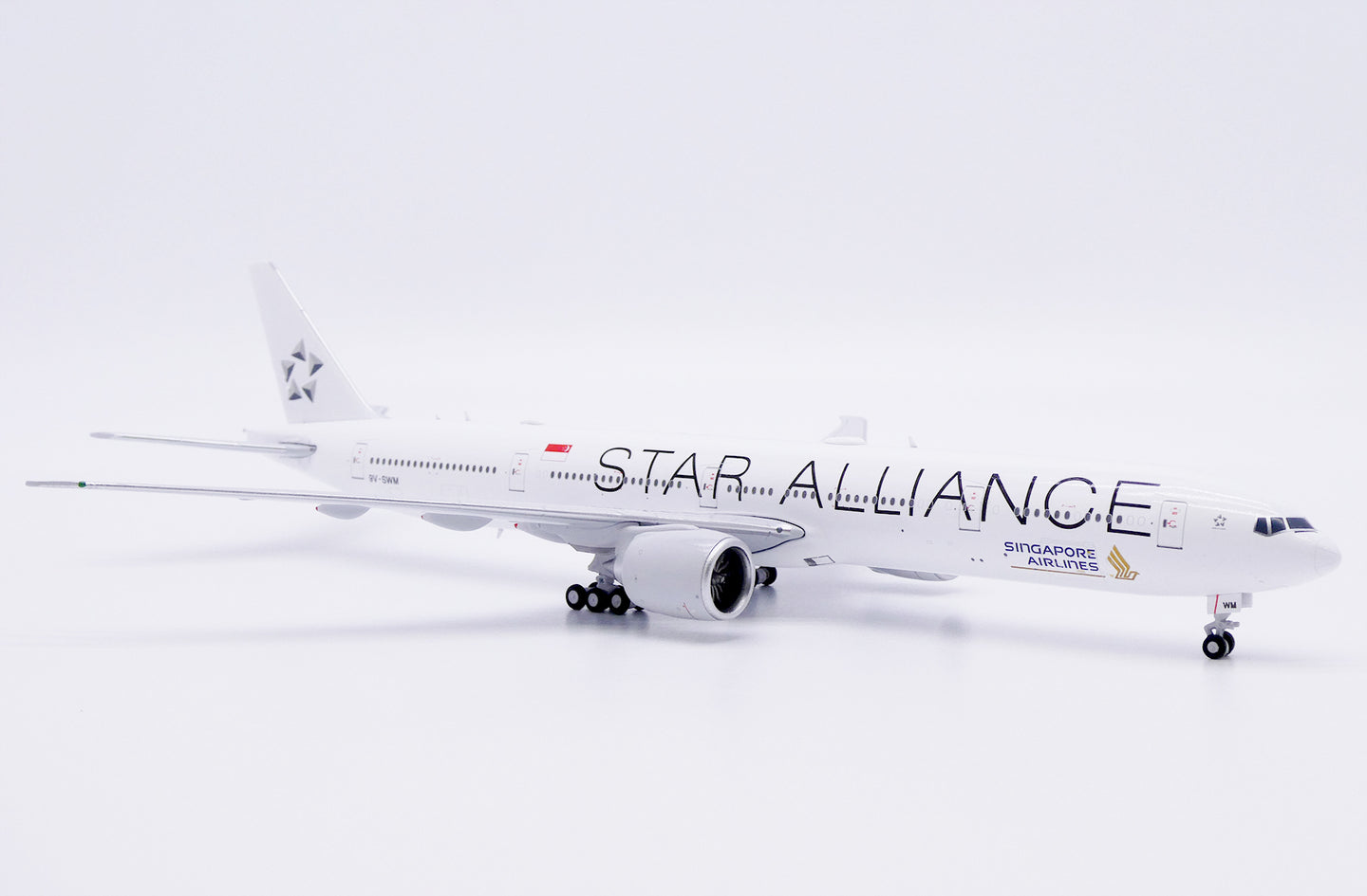JC WINGS B777-300ER SINGAPORE AIRLINES "STAR ALLIANCE" REG: 9V-SWM